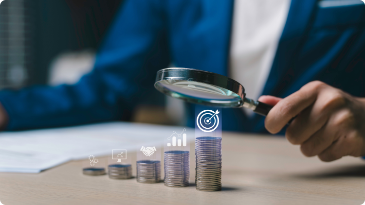 stacks of coins representing investment growth and a magnifying glass representing investment analysis.