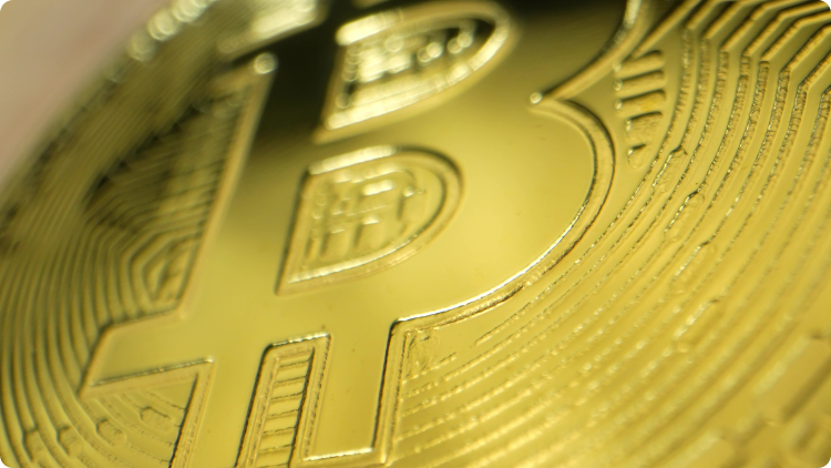 LogÃ³tipo da Bitcoin sob a forma de uma moeda dourada