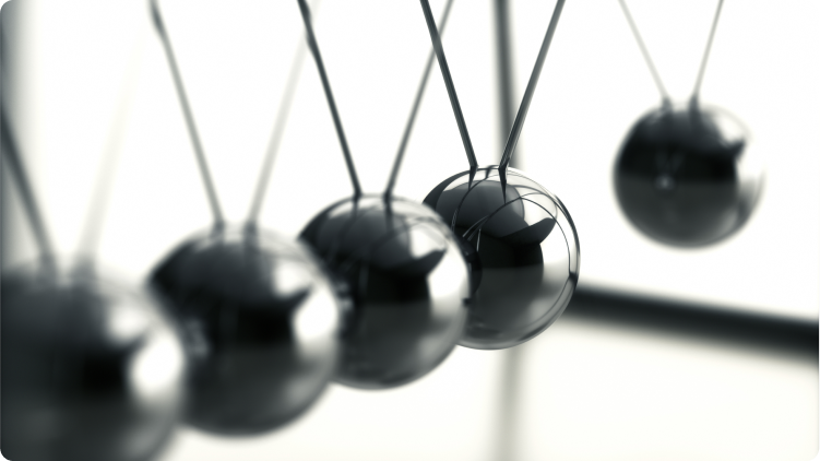 Newton's cradle on the move