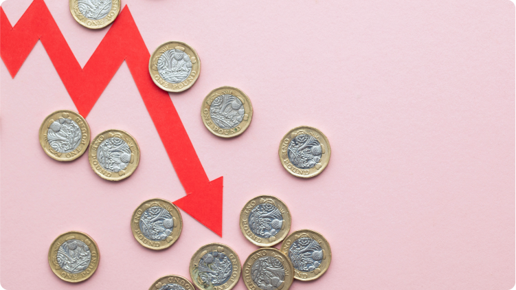  Visual representation of the money (coins) decrease in value with a red arrow painting downwards representing a financial crisis