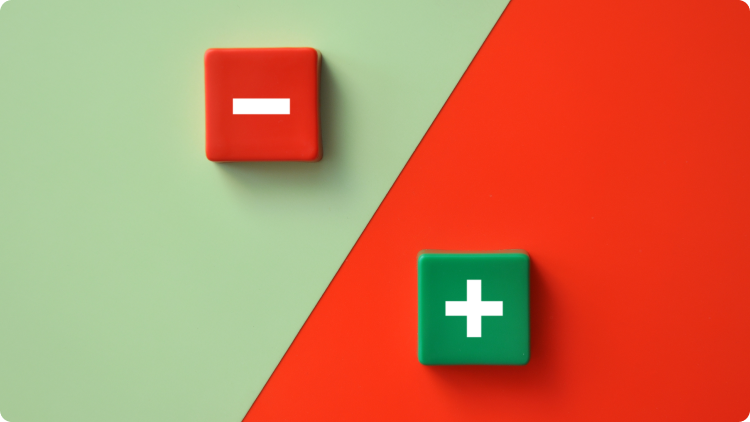 A visually striking red and green square adorned with a white plus and minus sign, representing pros and cons