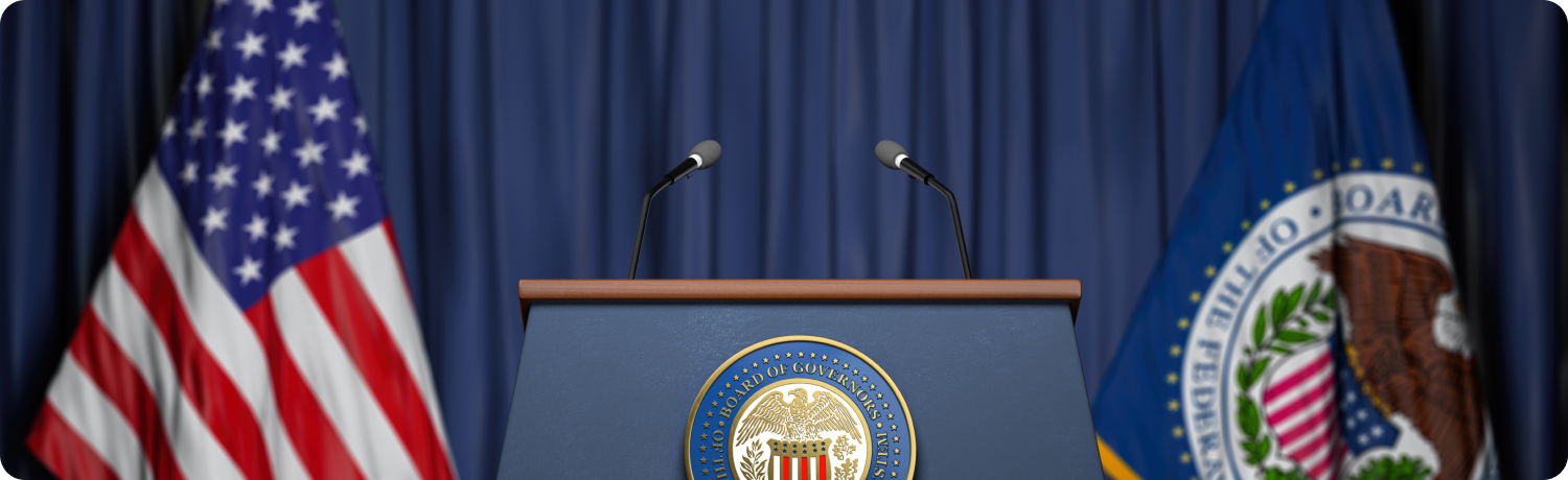 A podium featuring the American flag and an official seal, symbolizing authority and formal events