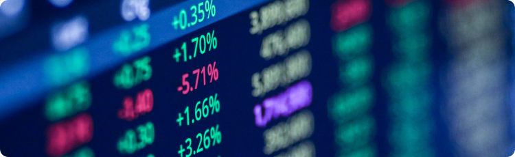 Stock market quotes displayed on a digital screen, showcasing real-time financial data and market trends