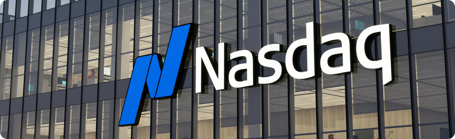 Nasdaq logo displayed prominently on a building wall