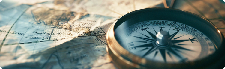 An image featuring a compass and a detailed map for route guidance