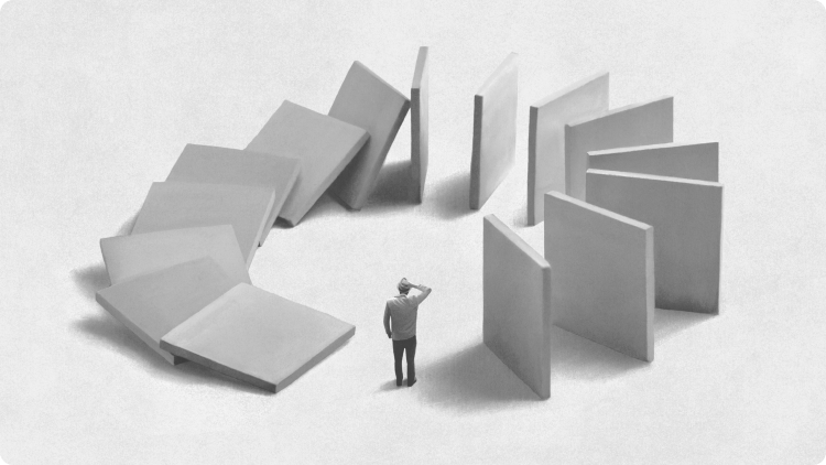 A human trying to stop falling dominoes, symbolizing a way to solve problems.