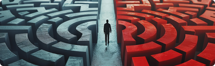 A man stands amidst a maze, with towering hedges creating a labyrinthine structure around him