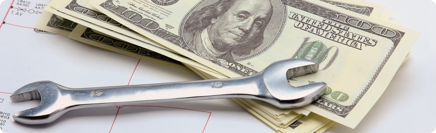 O cheie aÈezatÄ pe un teanc de bani aÈezat pe o foaie de hÃ¢rtie, simbolizÃ¢nd creÈterea financiarÄ Èi oportunitÄÈile