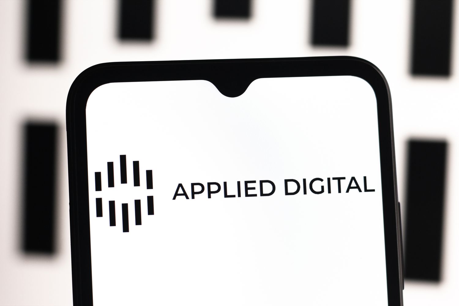 La pantalla de un telefono con el logo de Applied Digital