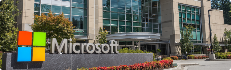 Trá»¥ sá» Microsoft vá»i logo, biá»u tÆ°á»£ng cá»§a cÃ´ng nghá» toÃ n cáº§u vÃ  áº£nh hÆ°á»ng trÃªn thá» trÆ°á»ng chá»©ng khoÃ¡n.