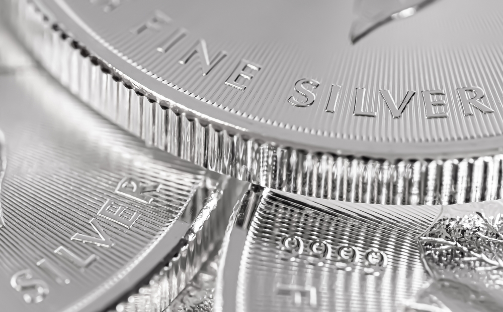  Imagen editorial ilustrativa de una moneda de lingotes de plata de hoja de arce canadiense