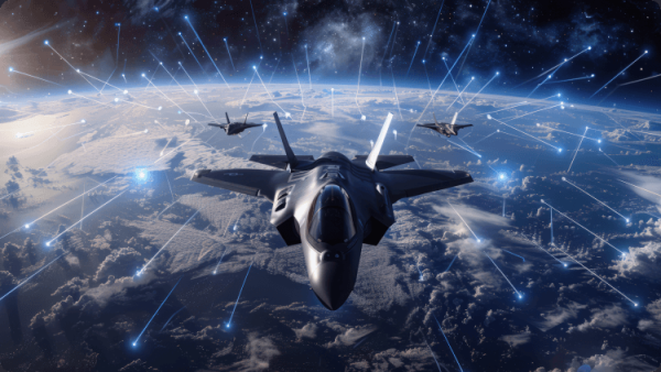 Stíhačka letiaca nad Zemou, ktorá na pozadí modrej oblohy a krajiny pod sebou predvádza svoj elegantný dizajn.