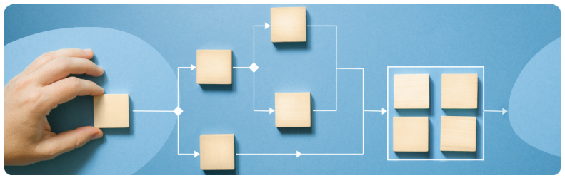 Une main touche dÃ©licatement un tableau bleu ornÃ© de blocs colorÃ©s, illustrant une expÃ©rience dâapprentissage interactive.