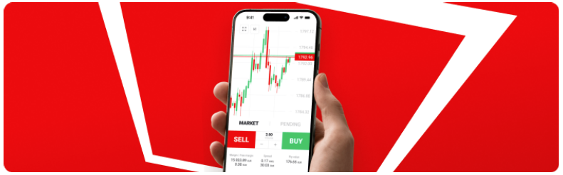 Une personne tenant un smartphone sur un fond rouge vif